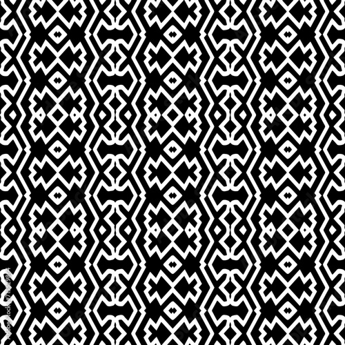 White background with black pattern. Seamless texture for fashion, textile design, on wall paper, wrapping paper, fabrics and home decor. Simple repeat pattern.