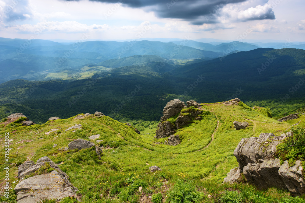 mountainous alpine scenery in summer. steep grassy slopes with stones. pikui mountain of watershed ridge. popular travel destination of ukrainian carpathian highland mountainous alpine scenery in summer. steep grassy slopes with stones. pikui mountain of watershed ridge. popular travel destination of ukrainian carpathian highland