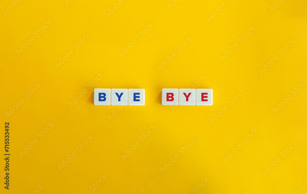 Bye Bye Text on Block Letter Tiles on Yellow Orange Background. Bye Bye Text on Block Letter Tiles on Yellow Orange Background.