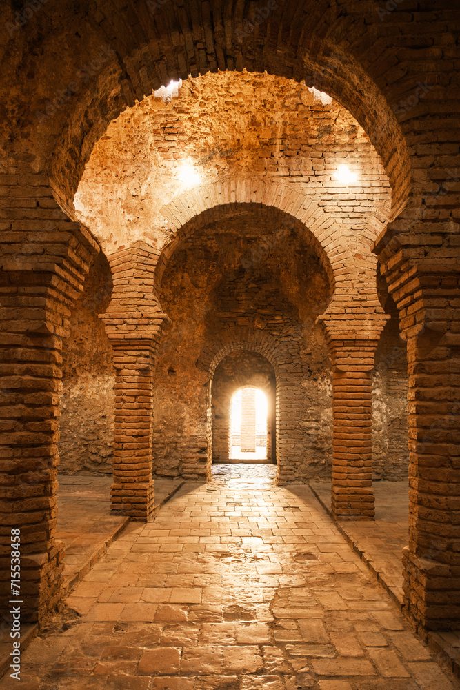 Fototapeta premium Interior of Arab Baths (Banos Arabes), Ronda, Andalucia, Spain. It is a unique archeological site showcasing a 13th-century bathhouse that was built during the Islamic period in Ronda.