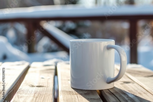 White mug on wooden table, Winter scene, Blurred background.