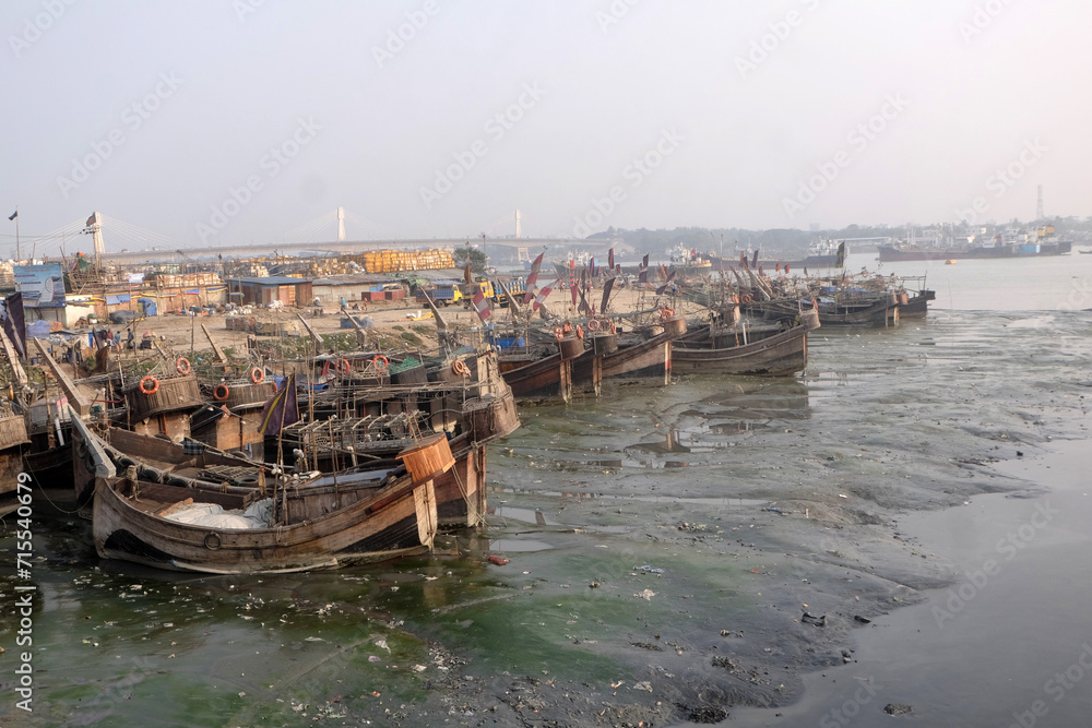 As the Chaktai canal of Chittagong is filled, the boats get stuck during the low tide. Due to this, businessmen and passengers suffered