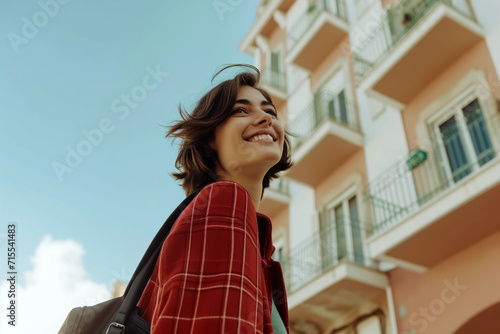 Cheerful Young Woman Walking in Urban Setting © Melipo-Art