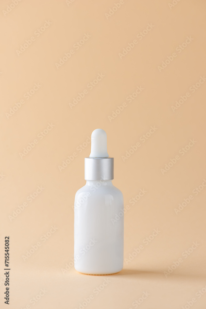 Facial essential oil or serum in a bottle with a pipette, copy space. Facial essential oil or serum in a bottle with a pipette, copy space.