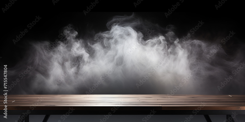 Wooden table with smoke on dark background