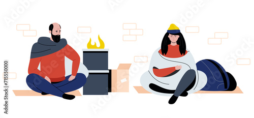 Homeless people sitting outside. Poor people in old clothing sitting on ground near fire. Depressed beggars