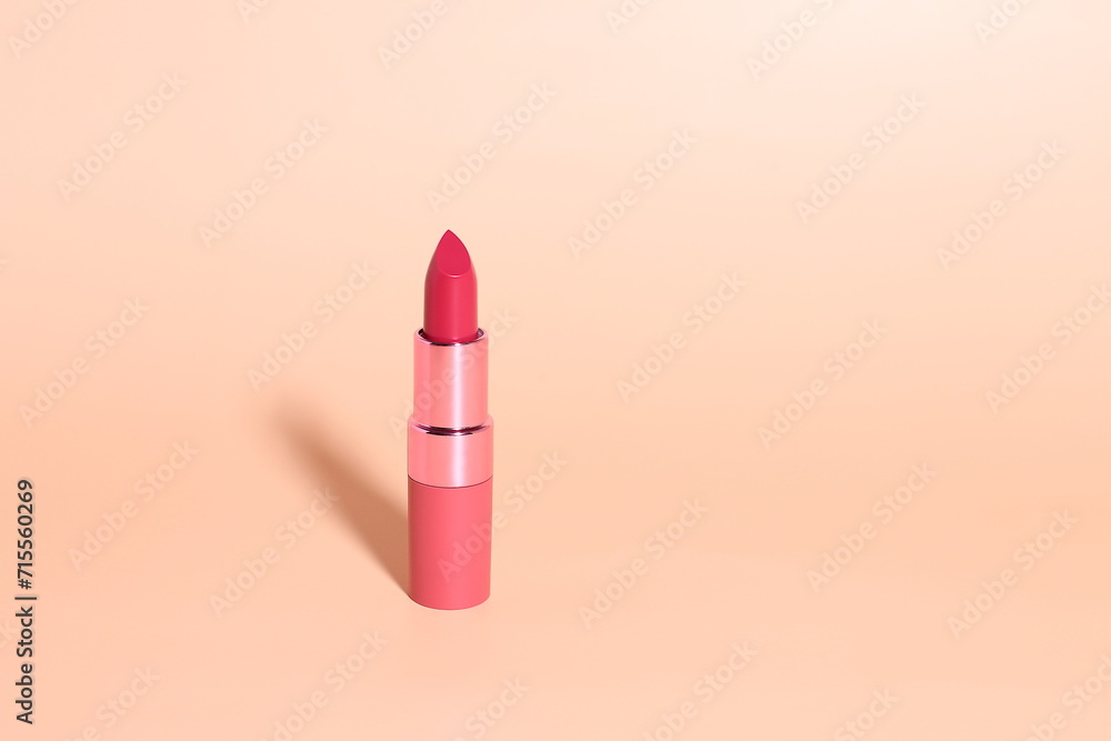 Lipstick mockup, red lip stick cosmetic on beige background Lipstick mockup, red lip stick cosmetic on beige background