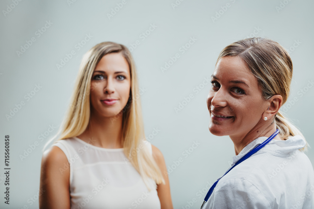 Patient smiles, doctor's touch conveys medical assurance Patient smiles, doctor's touch conveys medical assurance