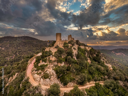 Photography Dramatic sunset sky over medieval Burriac castle near Mataro Spain