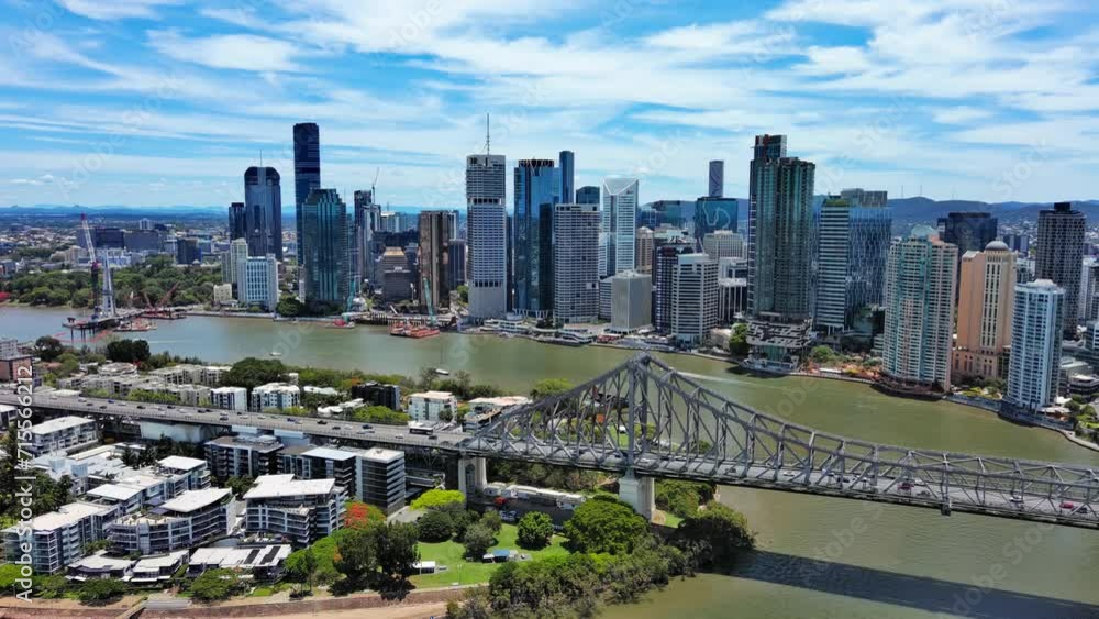 Brisbane, Australia: Aerial view of Story Bridge in capital city of Australian state of Queensland, skyscraper skyline of Brisbane central business district (CBD) on horizon Brisbane, Australia: Aerial view of Story Bridge in capital city of Australian state of Queensland, skyscraper skyline of Brisbane central business district (CBD) on horizon