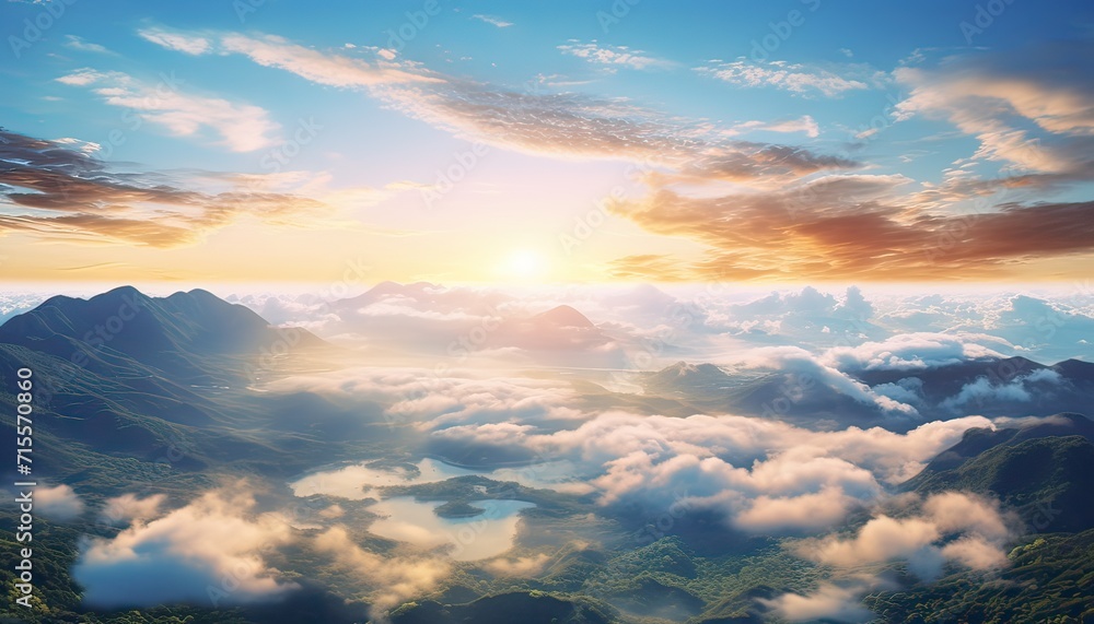 View of the sea of clouds from the top of the mountain peak. Tropical rainforest with vibrant morning reflection of the sunrise.