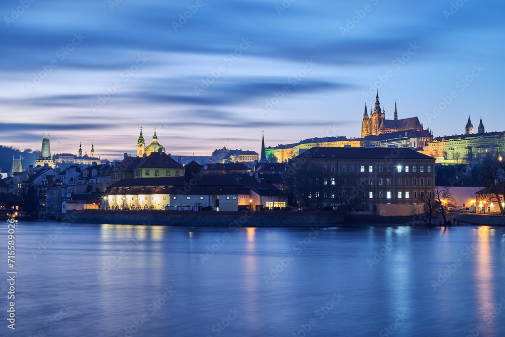 Cityscape evening view of Prague castle and Vltava river in Czech republic