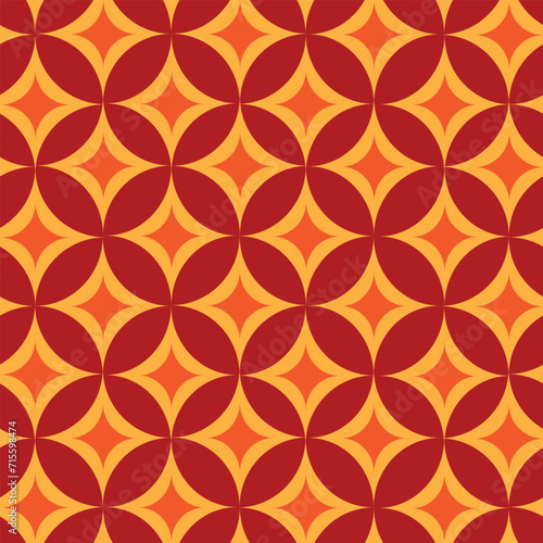 Mid Century Modern orange and yellow atomic starbursts seamless pattern on red background. For Wallpaper, home decor and fabric 