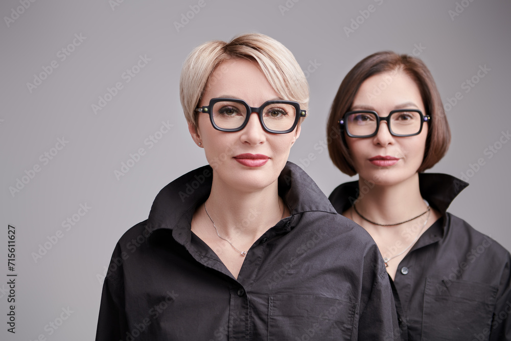 two stylish ladies two stylish ladies