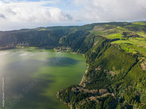 Hot and geothermal pools with park and mountains with forest in the background in the famous Furnas, São Miguel - Azores PORTUGAL