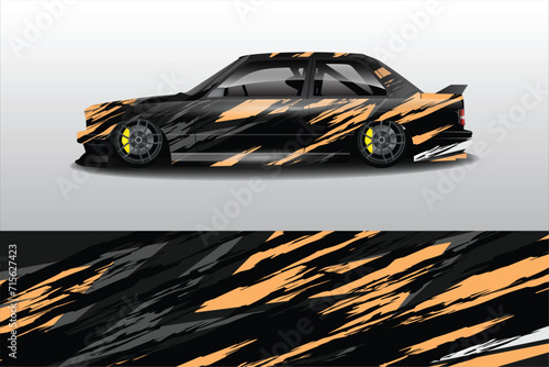 Fototapeta Naklejka Na Ścianę i Meble -  Car sticker design vector. Graphic grunge abstract lines racing background kit design for racing car vehicle