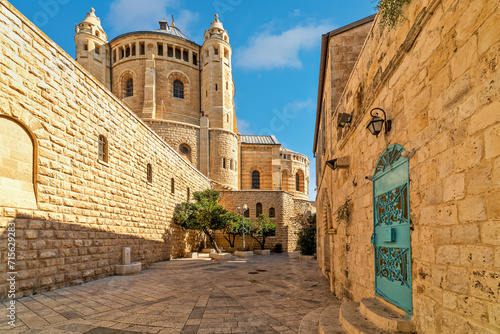 Narrow street and Dormition Abbey in Jerusalem, Israel. photo