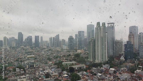 Jakarta, Indonesia – January 19, 2024: A rainy cityscape view of Indonesia capital city Jakarta