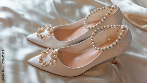 Weddings women white shoes with a heels with a flowers and pearls. Concept of Wedding, accessorize