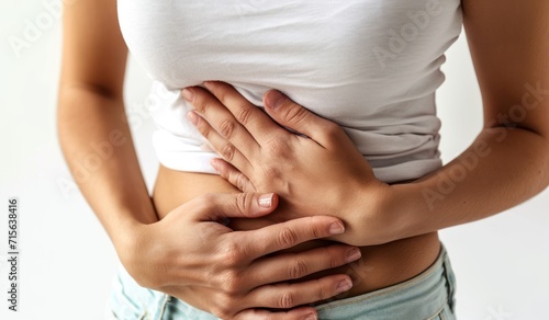 Wallpaper Mural Woman touching stomach painful suffering from stomachache causes of menstruation period, gastric ulcer, appendicitis or gastrointestinal system disease. Healthcare and health insurance concept. Torontodigital.ca