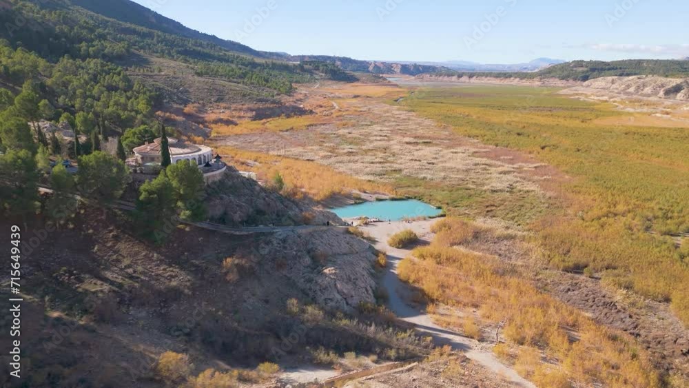 Aerial drone view on natural hotspring at lake Negratin in Spain. Aerial drone view on natural hotspring at lake Negratin in Spain.
