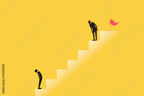 Successful businessman standing on top looking down and man looking up, which pointing up as symbol of achievement, success and developing business in successful way photo