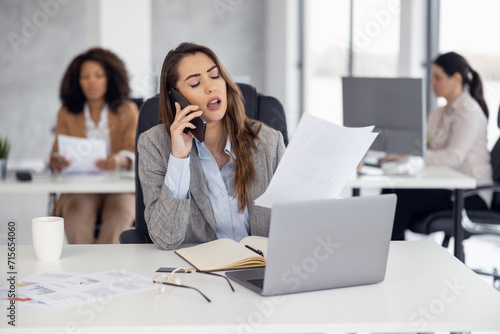 Young businesswoman having stressed day on work