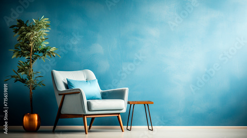 Modern living room interior with armchair and plant on blue wall background