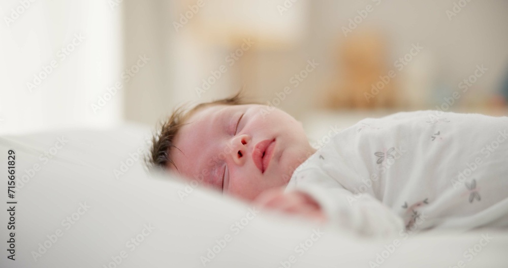 Tired, sleeping and newborn baby on a bed at a home in the bedroom for resting and dreaming. Cute, sweet and little infant, child or kid taking a nap in the morning in the nursery at family house. Tired, sleeping and newborn baby on a bed at a home in the bedroom for resting and dreaming. Cute, sweet and little infant, child or kid taking a nap in the morning in the nursery at family house.