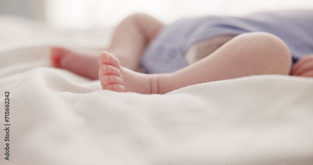Sleeping, dreaming and feet of baby on bed for child care, resting and relax in nursery. Adorable, cute and closeup of toes of innocent newborn infant for health, wellness and development at home - obrazy, fototapety, plakaty 