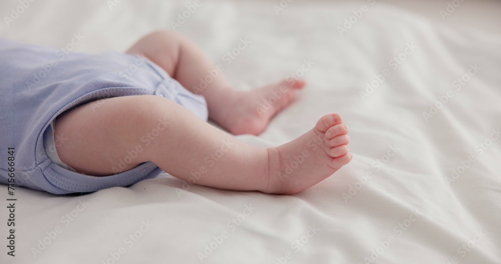 Adorable, family and feet of baby on bed for child care, relax and resting in nursery. Innocent, cute and closeup of toes of innocent newborn infant for health, wellness and development at home Adorable, family and feet of baby on bed for child care, relax and resting in nursery. Innocent, cute and closeup of toes of innocent newborn infant for health, wellness and development at home