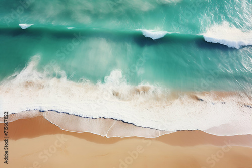 Aerial view of beautiful sandy beach with turquoise ocean waves