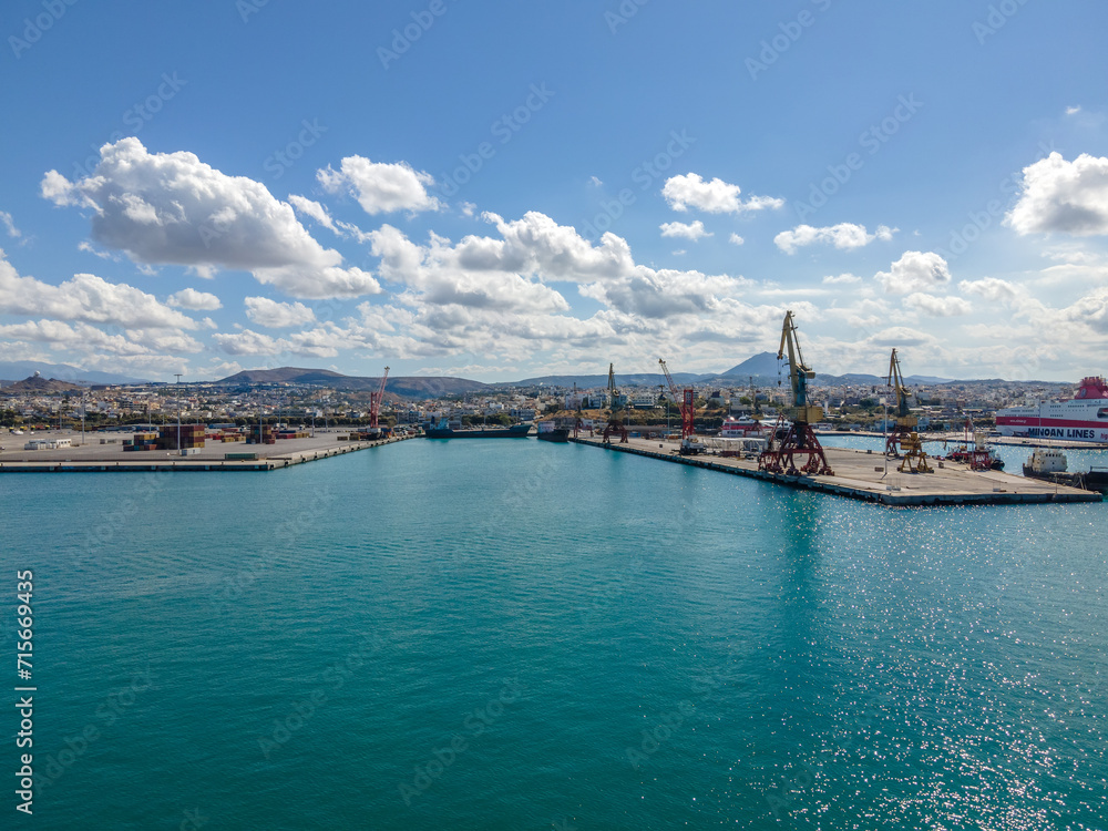 Heraklion, Greece - October 10, 2020: Sea port with cranes and containers.