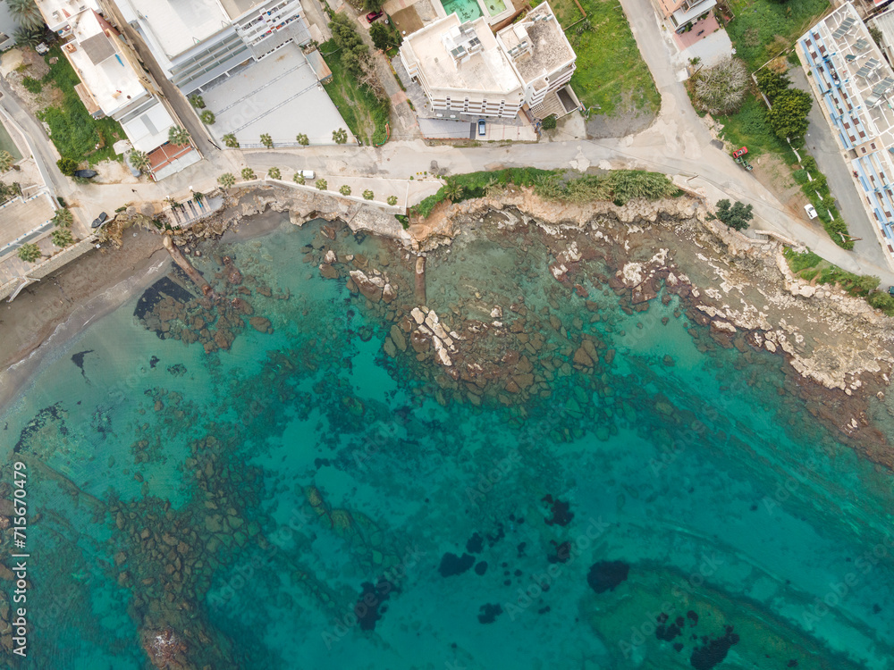 Aerial top view by drone of cretan landscape with sea.