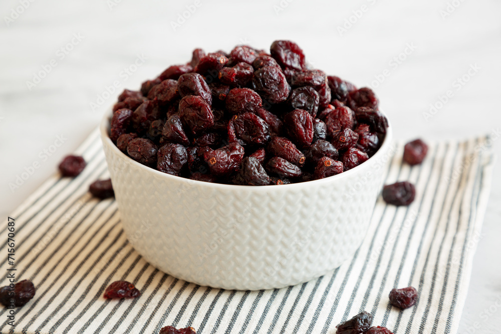 Organic Dried Cranberries in a Bowl, side view. Organic Dried Cranberries in a Bowl, side view.
