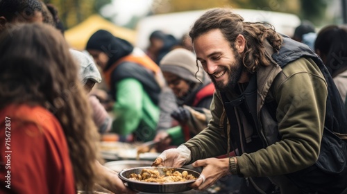 Volunteers distribute food to homeless people, social issues, assistance to victims photo