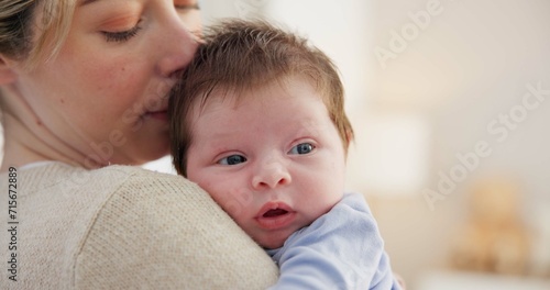 Love, mother and baby in nursery for bonding, touch or cuddle with support or care in house. Woman, mom or holding newborn in bedroom with bond and relax for child development and nurture in home