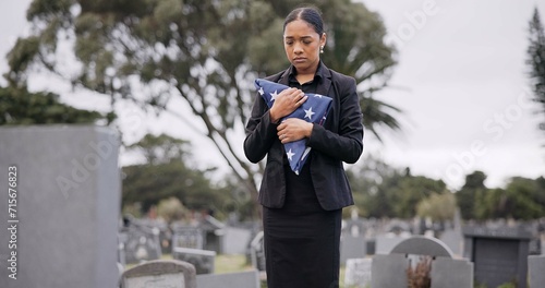 Cuadro en lienzo Funeral, death and a sad woman with an american flag at a cemetery in mourning at a memorial service