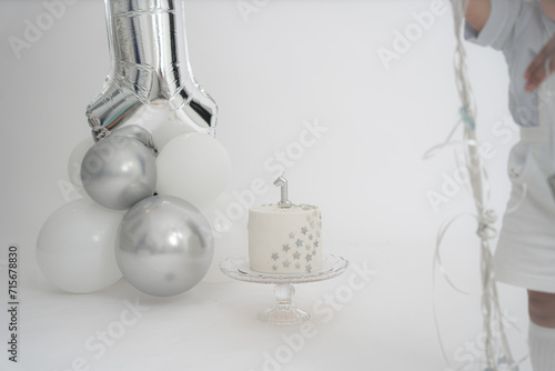 First Birthday cake white and silver 1st birthday cake with copy space. stars theme first birthday cake. 