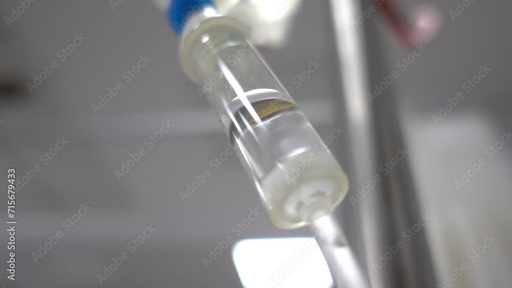 Fethiye, Turkey - 7th of January 2023: 4K Close up viewing medication dripping in dropper tube
Fethiye, Turkey - 7th of January 2023: 4K Close up viewing medication dripping in dropper tube