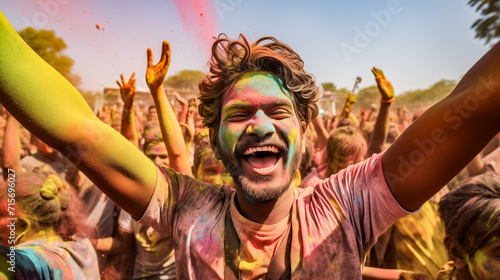 Smiling and happy boy is dancing at the Holi festival. AI Generated