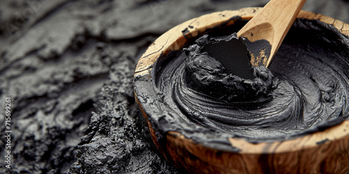 Black mud, extracted from peat, is used in naturopathy as a natural alternative treatment. photo