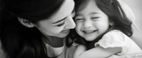 Loving moment between mother and daughter in monochrome