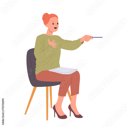Woman school psychologist sitting on chair holding pen and talking holding therapeutic session