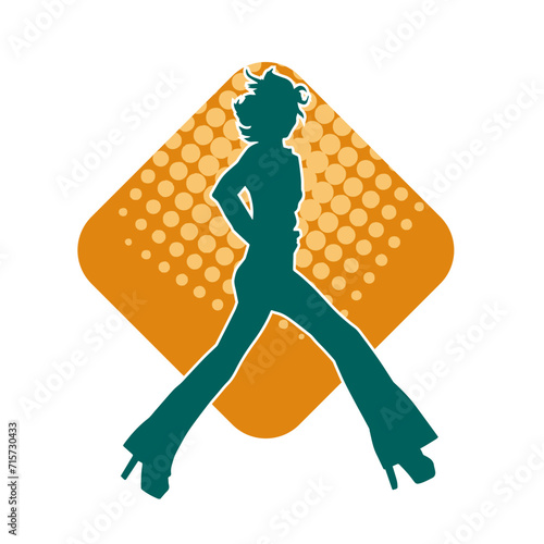 Silhouette of a slim female in dance pose. Silhouette of a woman dancing.