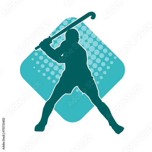 Silhouette of male field hockey athlete in action. Silhouette of a man playing field hockey sport.