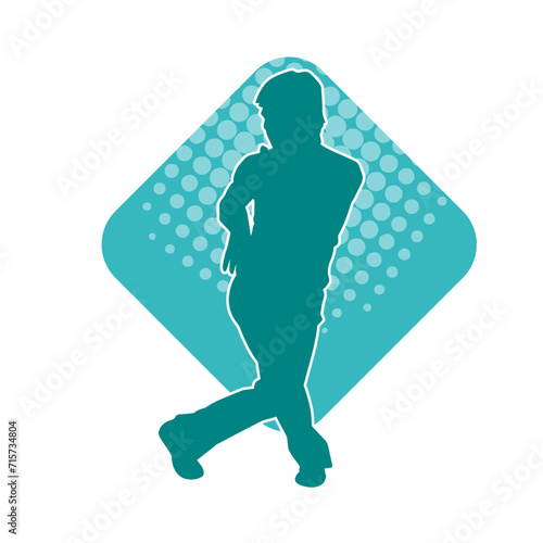 Silhouette of a man in oriental martial art pose. Silhouette of a male in martial art move.