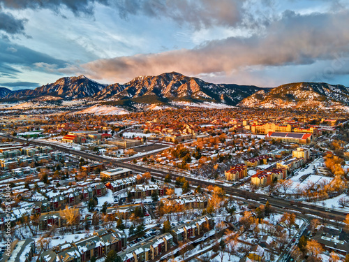 Carta da parati Drone view of University of Colorado, Boulder and the Flatirons at sunrise in the winter snow
