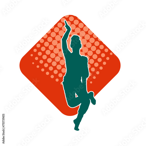 Silhouette of a female dancer in action pose. Silhouette of a woman dancing happily.