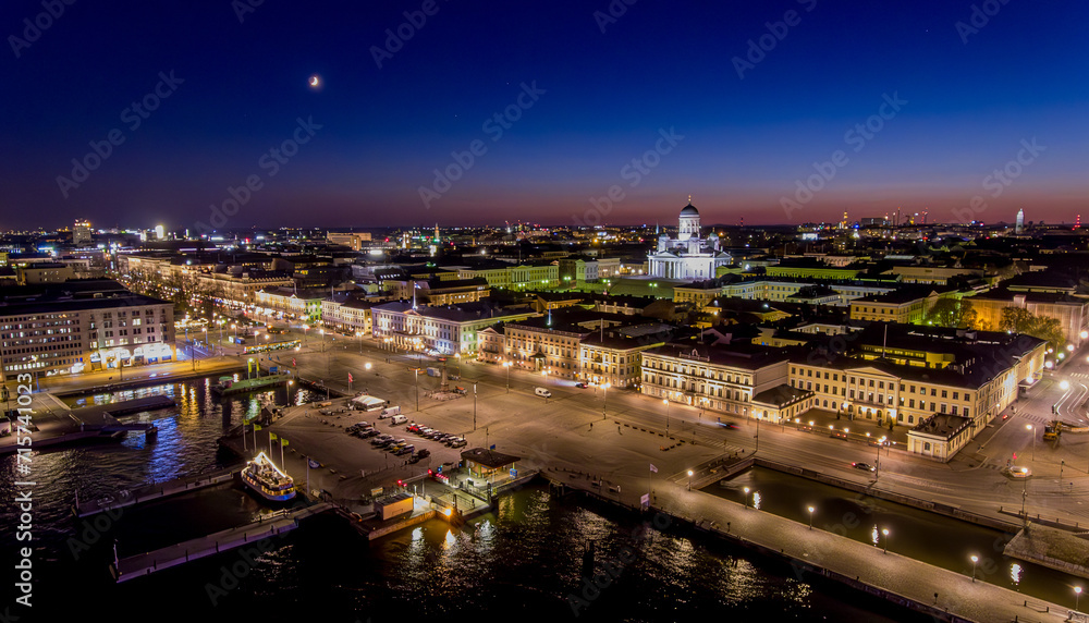 Quiet Helsinki by night. A  drone view to the city center, Market Square and Helsinki Cathedral